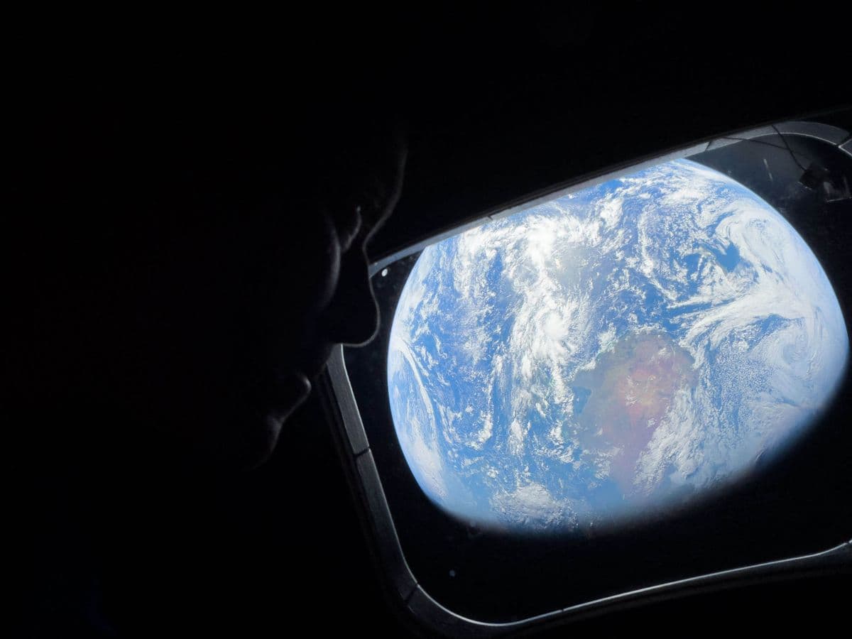 Apr 3, 2026: NASA astronaut CHRISTINA KOCH reads on a tablet in the dimly lit Orion crew capsule in this April 3, 2026, photo. To the right of the image's center, CSA (Canadian Space Agency) astronaut Jeremy Hansen is seen in profile peering out of one of Orion's windows. Lights are turned off to avoid glare on the windows. On the third day of the Artemis II mission, the astronauts began preparing Orion's cabin for lunar flyby. They also exercised, practiced medical response procedures, and tested the spacecraft's emergency communications system in deep space. 03 Apr 2026 Pictured: April 4, 2026: NASA astronaut and Artemis II Commander REID WISEMAN peers out of one of the Orion spacecraft's main cabin windows, looking back at Earth, as the crew travels towards the Moon. The pictures were released on the third day of the first mission since 1972 to send people around the moon. Photo credit: ZUMAPRESS.com / MEGA TheMegaAgency.com sales@mega.global